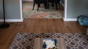 A dining area with a table and chairs, a chandelier, and a patterned rug. - Go Braves!- 3bd/2ba 6min from Mercedes-Benz/CNN/GWCC (Atlanta)