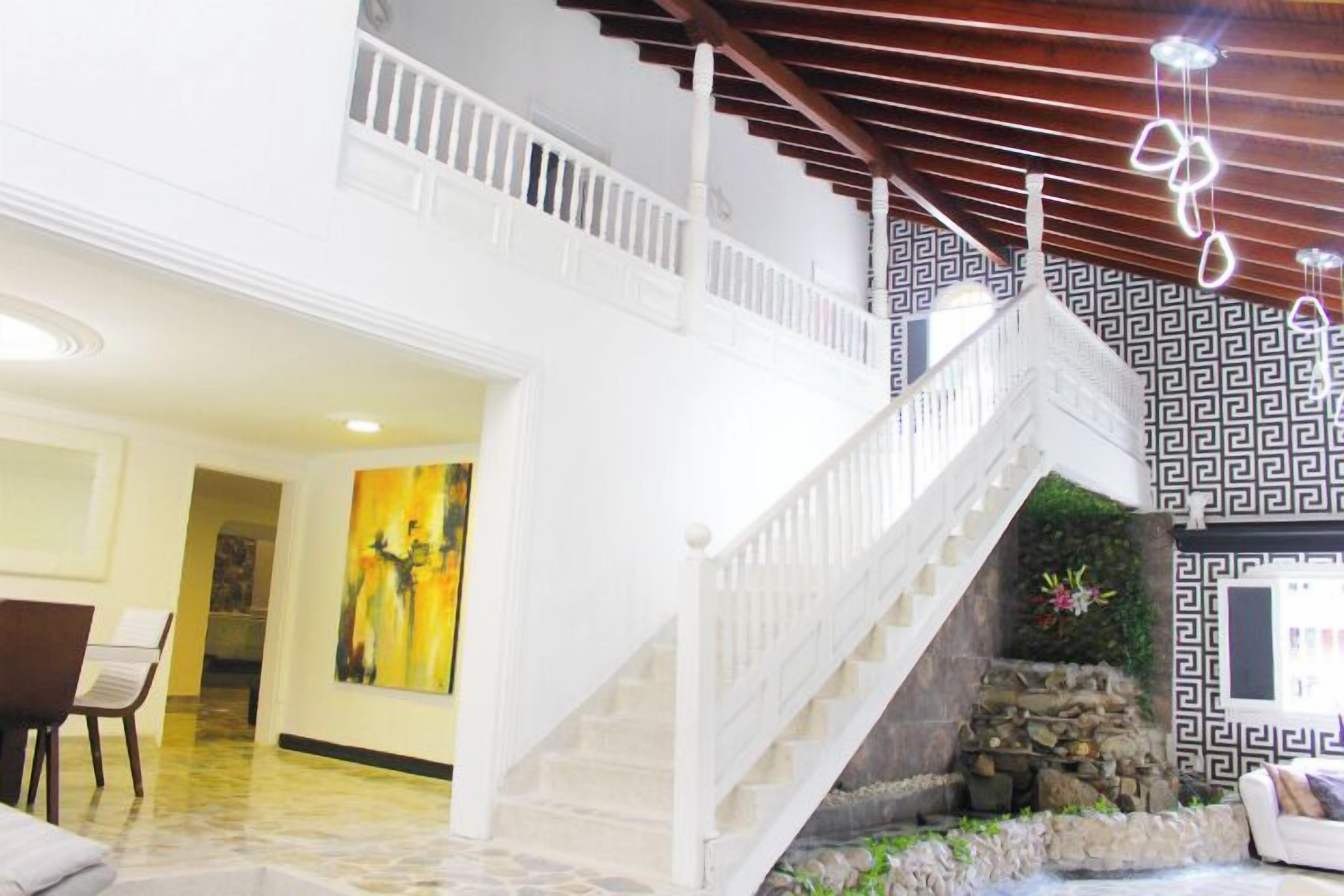 Premium Villa, 6 Bedrooms | Living area | 40-inch Smart TV with digital channels