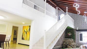 Premium Villa, 6 Bedrooms | Living area | 40-inch Smart TV with digital channels
