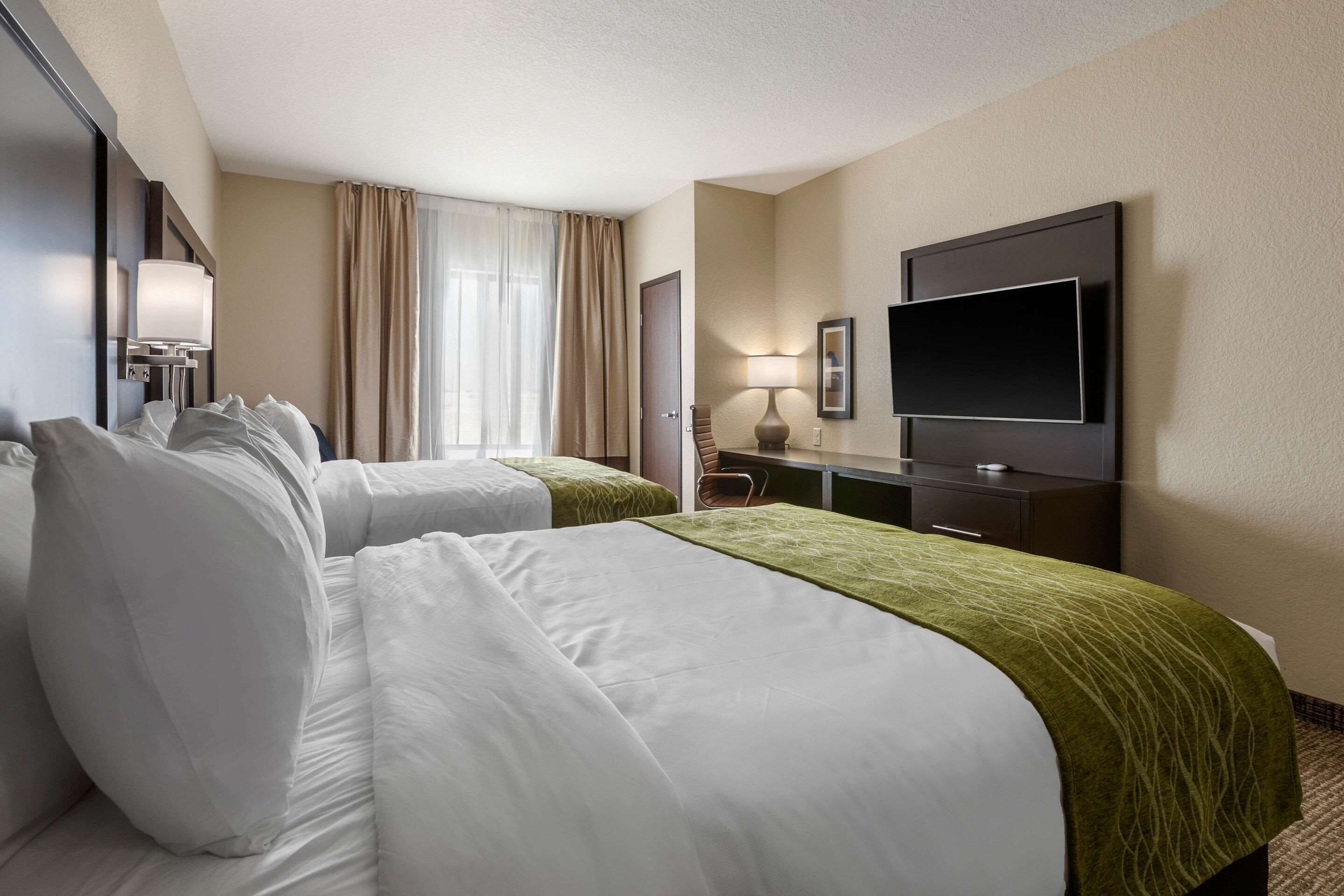 room, 2 queen beds, non smoking (larger unit) | premium bedding, pillow-top beds, desk, blackout curtains