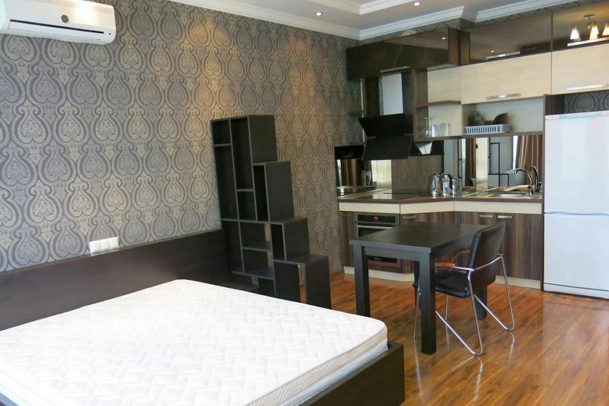 Apartamento, 1 quarto | Roupas de cama premium, camas Select Comfort, cortinas blackout