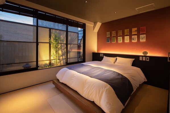 Suite, 3 chambres | Articles de minibar gratuits, décor unique, fer et planche à repasser