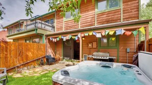A wooden house with a hot tub, a barbecue grill, and a covered patio area. - 2 Mi to Frisco Ski Hill: Mountain Home w/ Hot Tub! (Frisco)