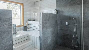 Shower, eco-friendly toiletries, hair dryer, towels