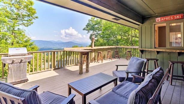 A deck with outdoor seating, a grill, and a sign reading "APRES SKI". - Cabin w/ Fireplace & Mountain Views: 5 Mi to Boone (Blowing Rock)