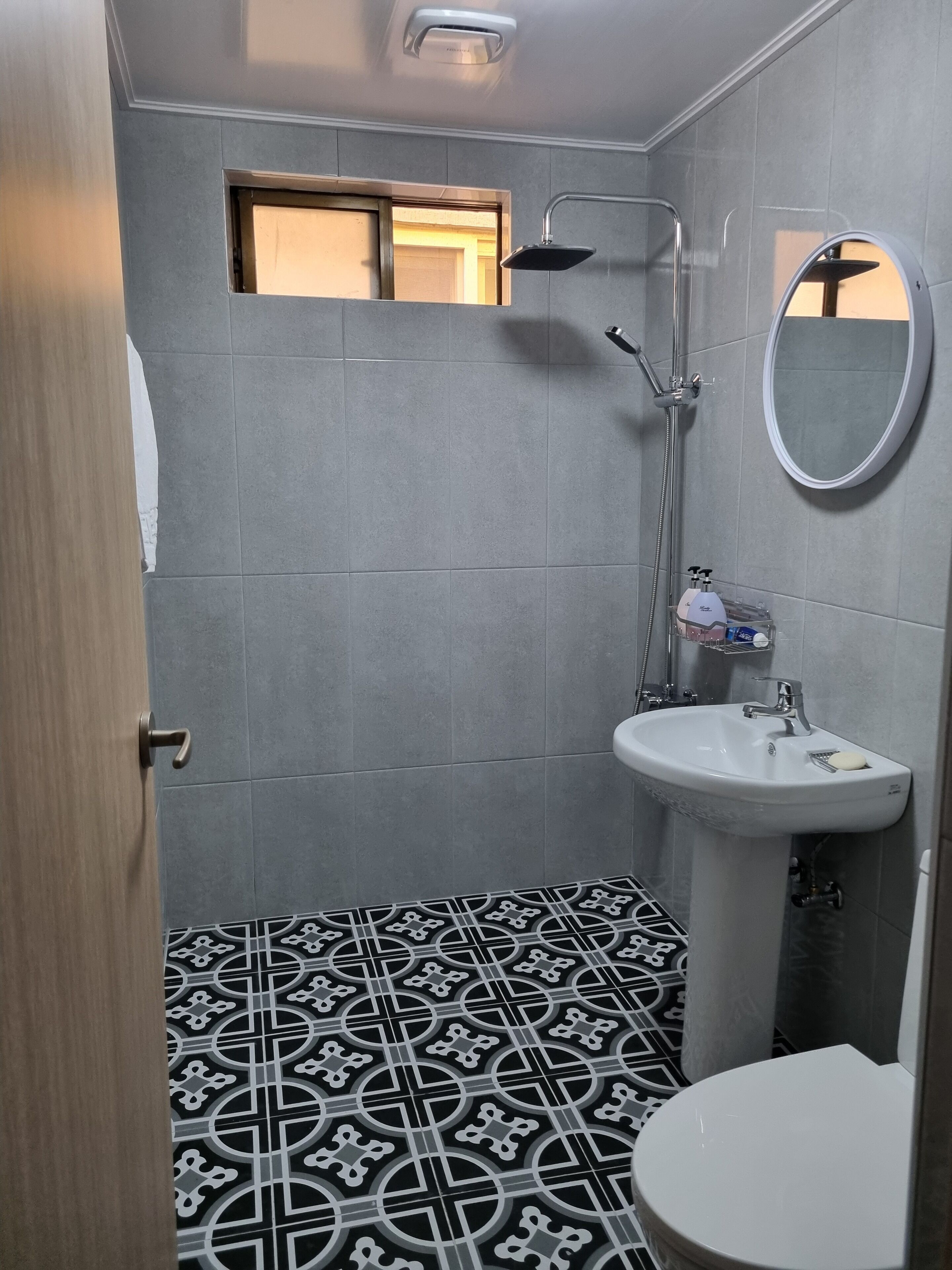 Shower, free toiletries, hair dryer, slippers