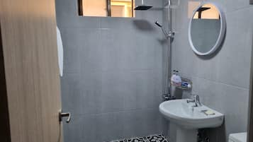 Shower, free toiletries, hair dryer, slippers