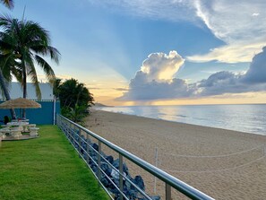 On the beach, sun-loungers, beach towels