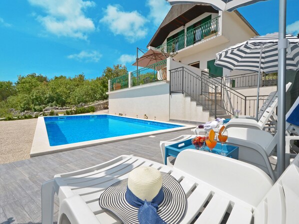 Outdoor pool, sun loungers