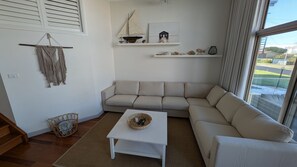 TV, Netflix, streaming services - Sunset on Birubi, 2/40 Ocean Ave - pet friendly, air con, water views, WIFI and outdoor spa (Anna Bay)
