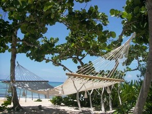 On the beach, sun-loungers, beach towels