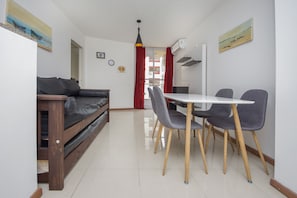 Apartment, Multiple Beds, Non Smoking | Living area | 32-inch LED TV with cable channels, TV