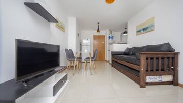 Apartment, Multiple Beds, Non Smoking | Living room | 32-inch LED TV with cable channels, TV