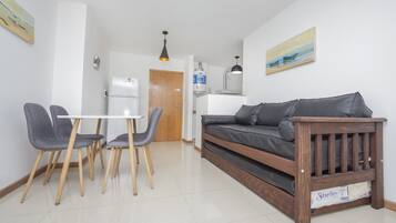 Apartment, Multiple Beds, Non Smoking | Living room | 32-inch LED TV with cable channels, TV