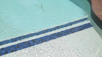 Outdoor pool, pool umbrellas, sun loungers