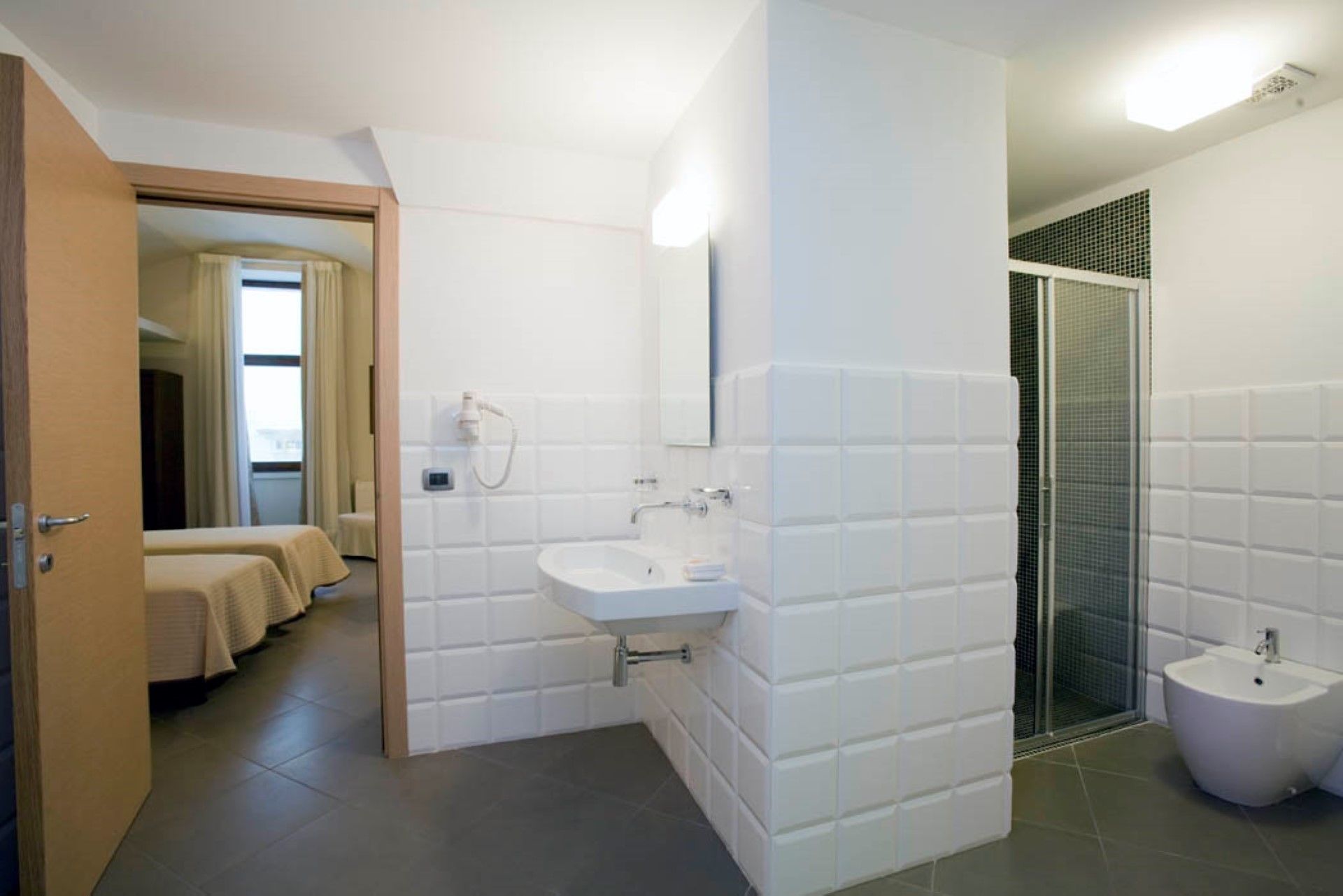 double or twin room | bathroom | free toiletries, hair dryer, bidet, towels