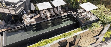 Outdoor pool, open 6:00 AM to 9:00 PM, pool umbrellas, sun loungers