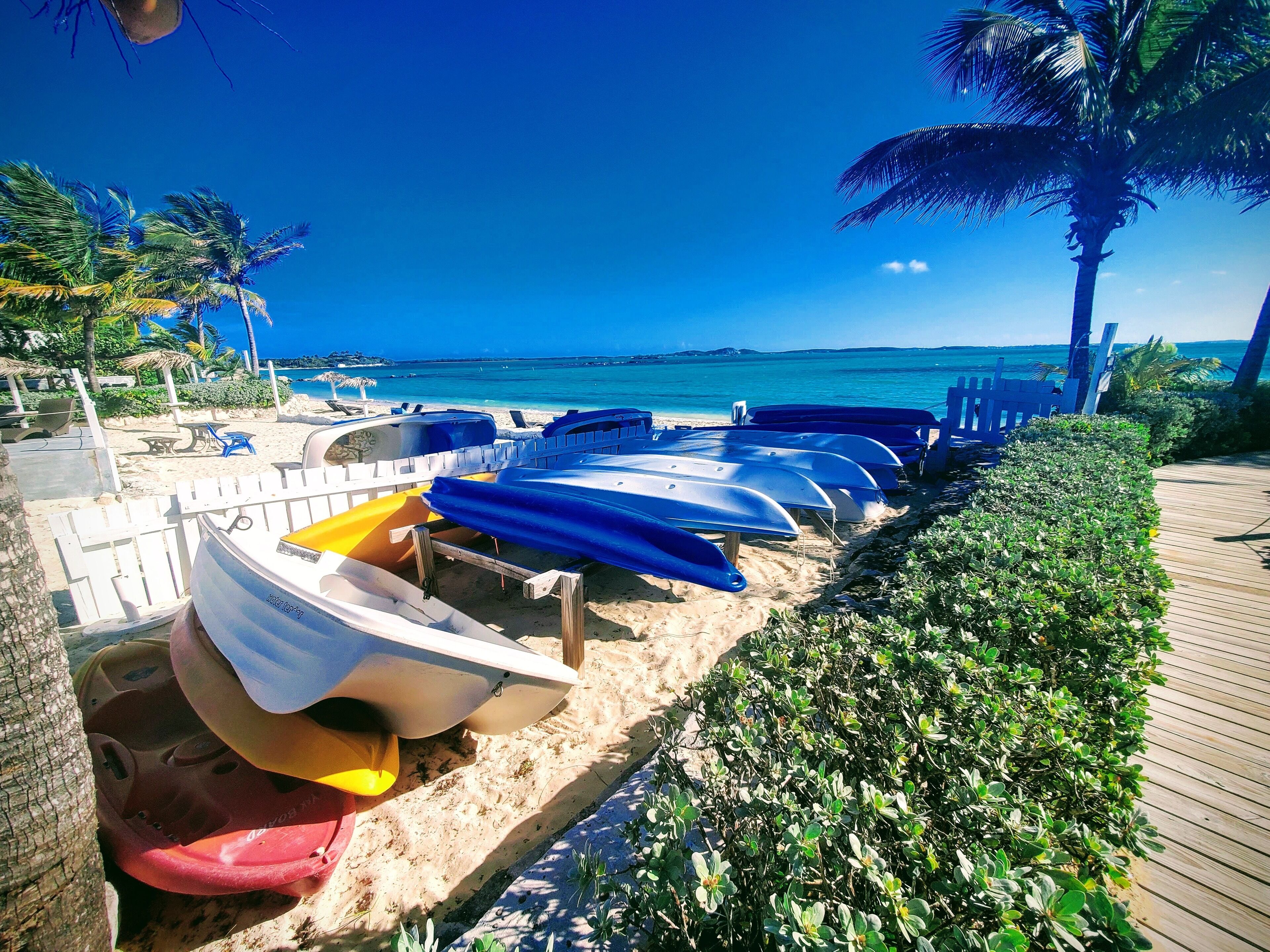On the beach, sun loungers, beach towels