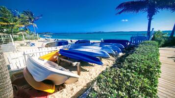On the beach, sun loungers, beach towels
