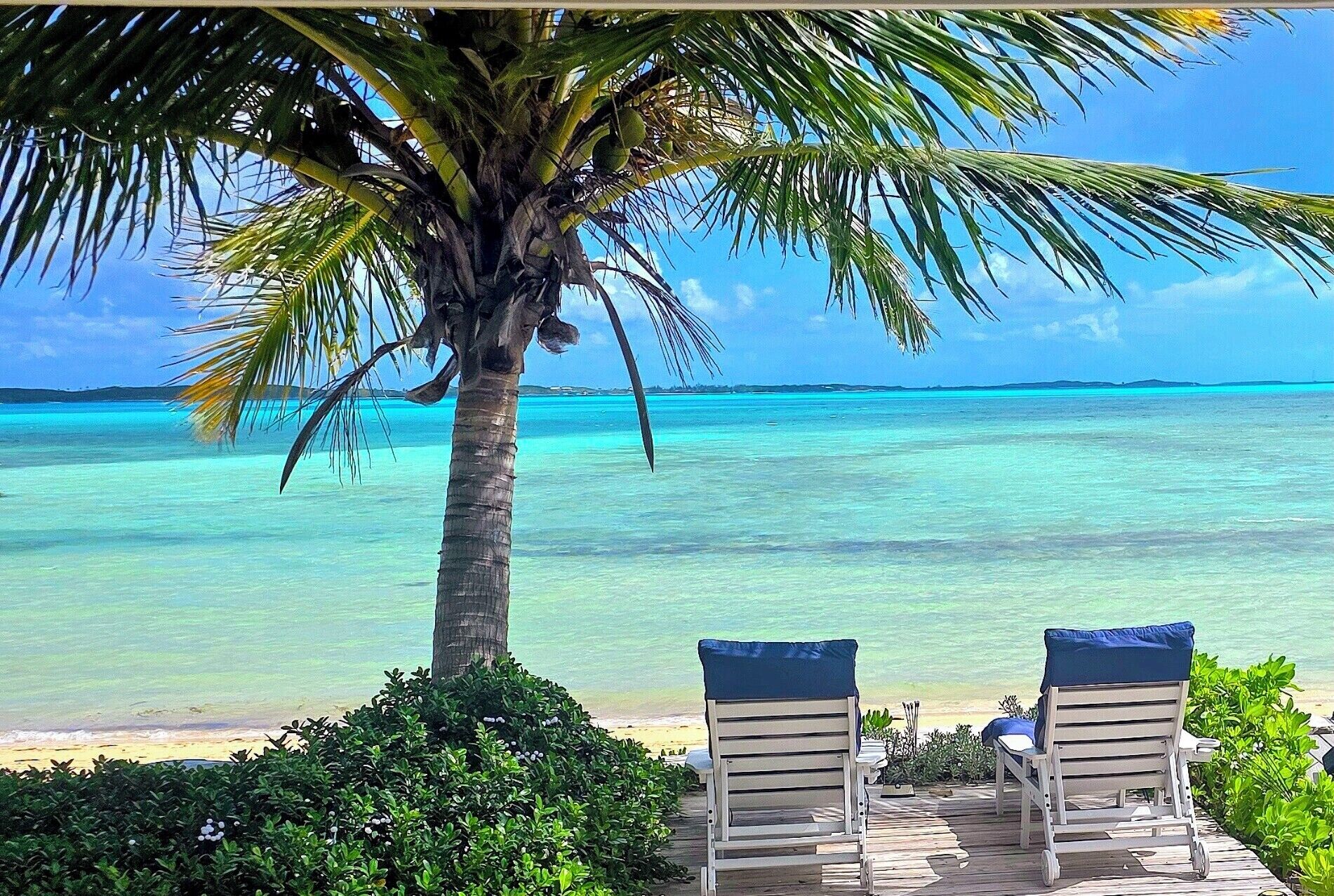 On the beach, sun-loungers, beach towels