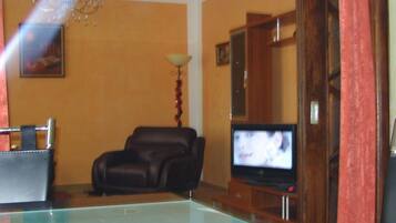 Classic Apartment, Accessible, City View | Living room | LED TV, DVD player