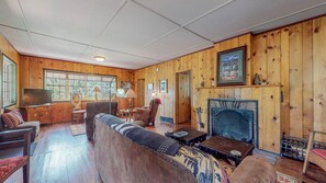 Smart TV, fireplace, DVD player, books