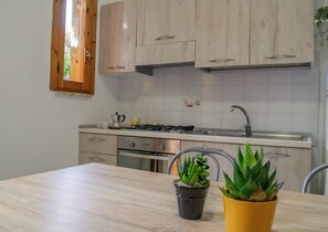 Family Apartment, 2 Bedrooms, Patio | Living area | LCD TV