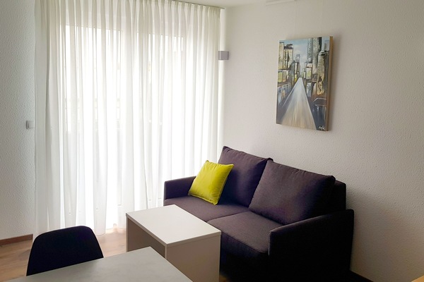 Apartment (Split Level) | Living area | Flat-screen TV