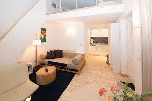 Basic Apartment, 1 Bedroom, Mezzanine | Living area | Flat-screen TV, DVD player - Villa Franz (Heringsdorf)