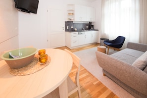 Deluxe Apartment, Ground Floor | Living area
