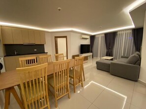 Deluxe Condo, 2 Bedrooms, Balcony | Living area | 40-inch flat-screen TV with cable channels, TV - Maldives Resort by PSR ASIA (Pattaya)