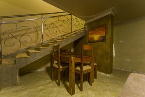 40-inch flat-screen TV with satellite channels, TV - Victoria Breeze Hotel Apartment (Iganga)