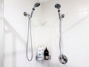 Combined shower/bathtub, hair dryer, towels, soap