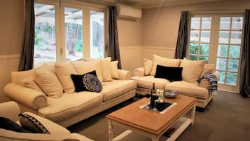 Smart TV, fireplace, DVD player, books