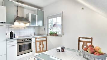 Condo, 1 King Bed | Private kitchen | Fridge, microwave, oven, stovetop