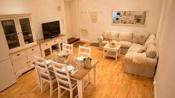 Apartment, 2 Bedrooms | Living area | Flat-screen TV
