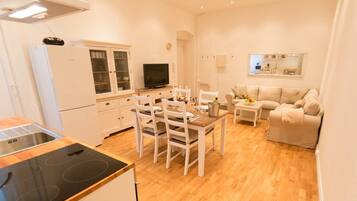 Apartment, 2 Bedrooms | Living area | Flat-screen TV