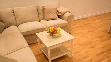 Apartment, 2 Bedrooms | Living room | Flat-screen TV