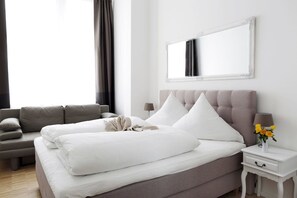 Blackout curtains, iron/ironing board, rollaway beds, free WiFi