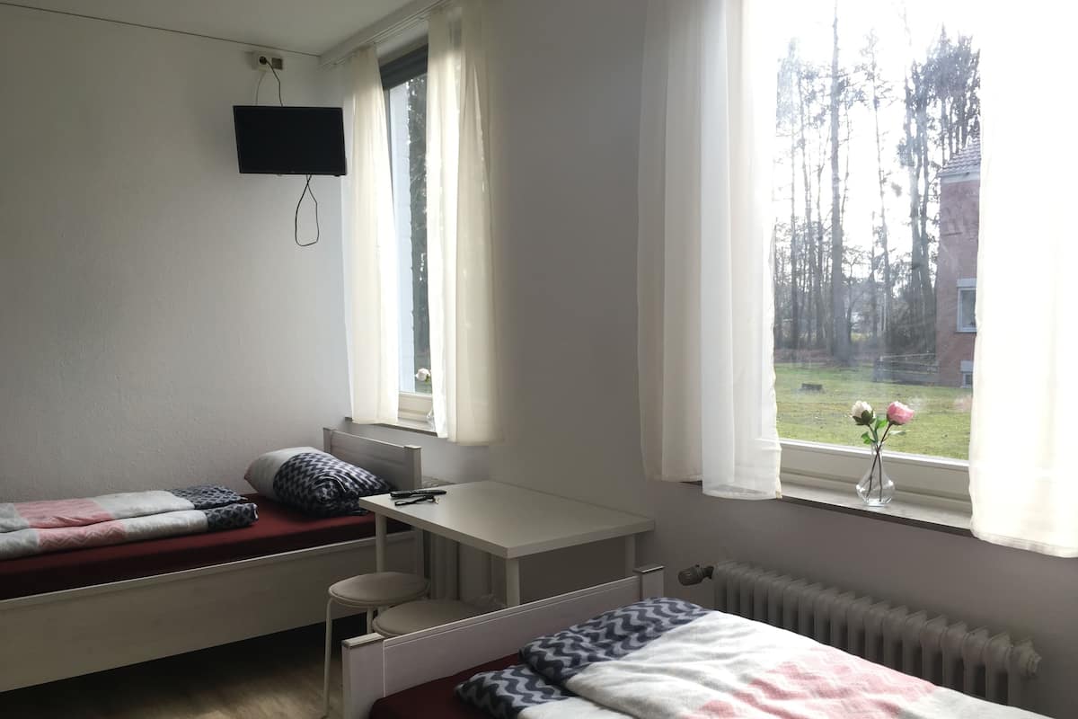 Habitación doble | Escritorio, wifi gratis y ropa de cama