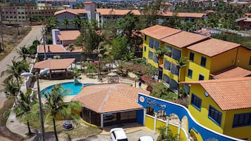 Experience the vibrant atmosphere of this hotel, surrounded by lush greenery and scenic views.