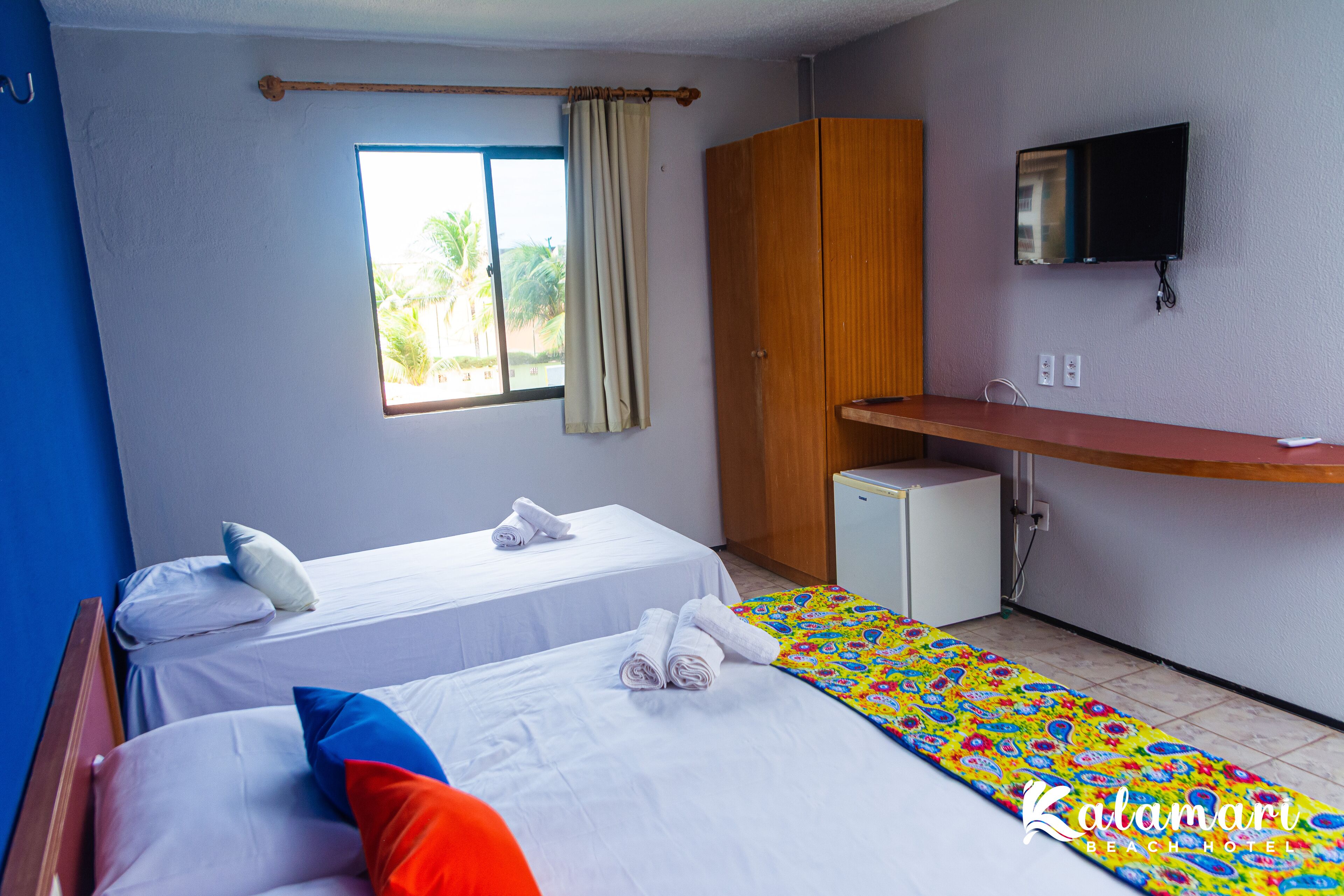 Triple Room, Multiple Beds | Minibar, desk, blackout drapes