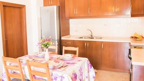 Apartment | Private kitchen | Coffee/tea maker, full-size fridge, oven, stovetop - Arkasa riverside apartment (Karpathos)