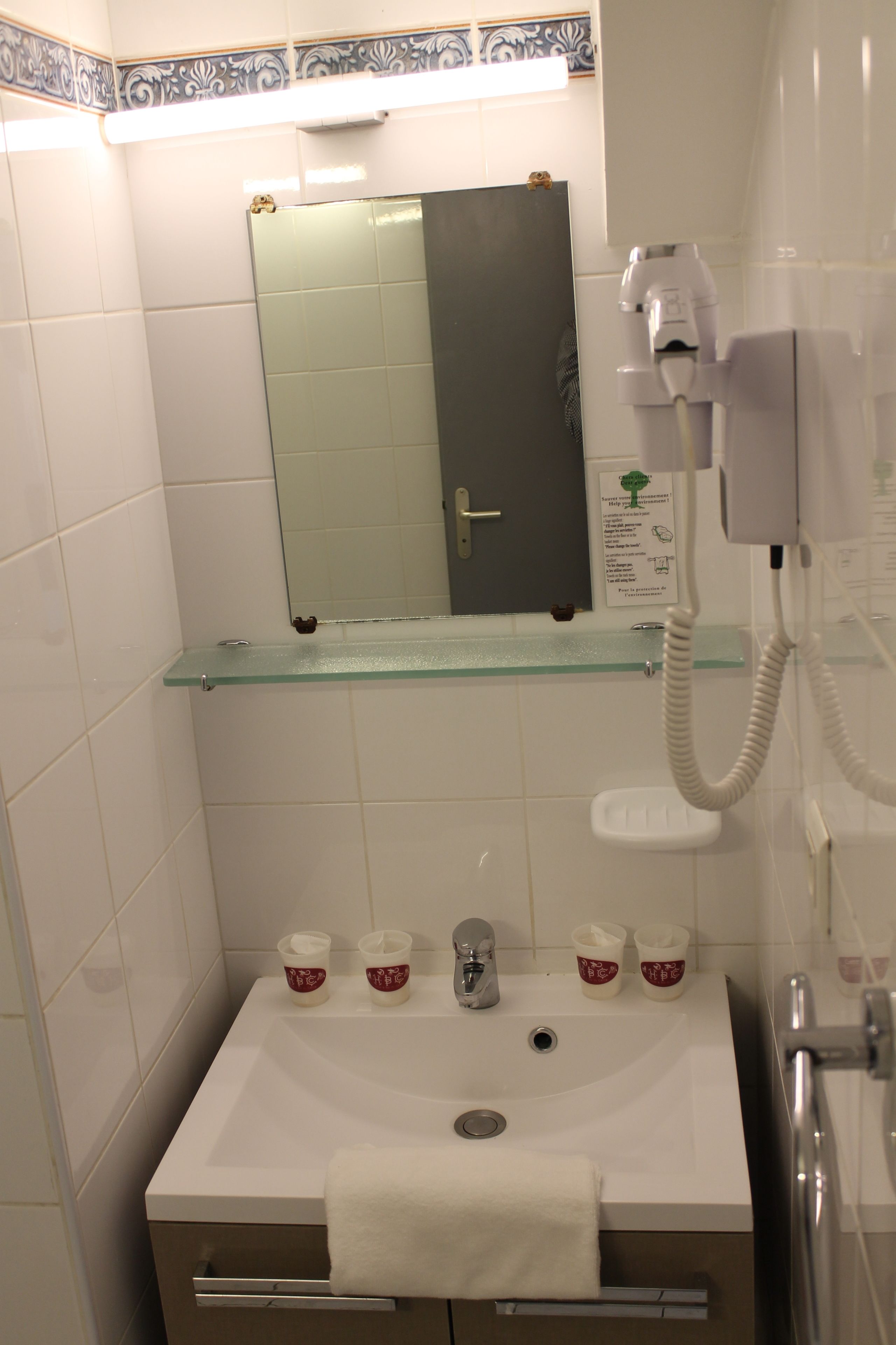 quadruple room, multiple beds | bathroom sink