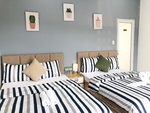 Family Room, Balcony | Desk, free WiFi, bed sheets