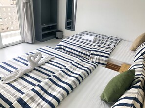Family Room, Balcony | Desk, free WiFi, bed sheets
