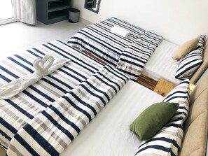 Family Room, Balcony | Desk, free WiFi, bed sheets