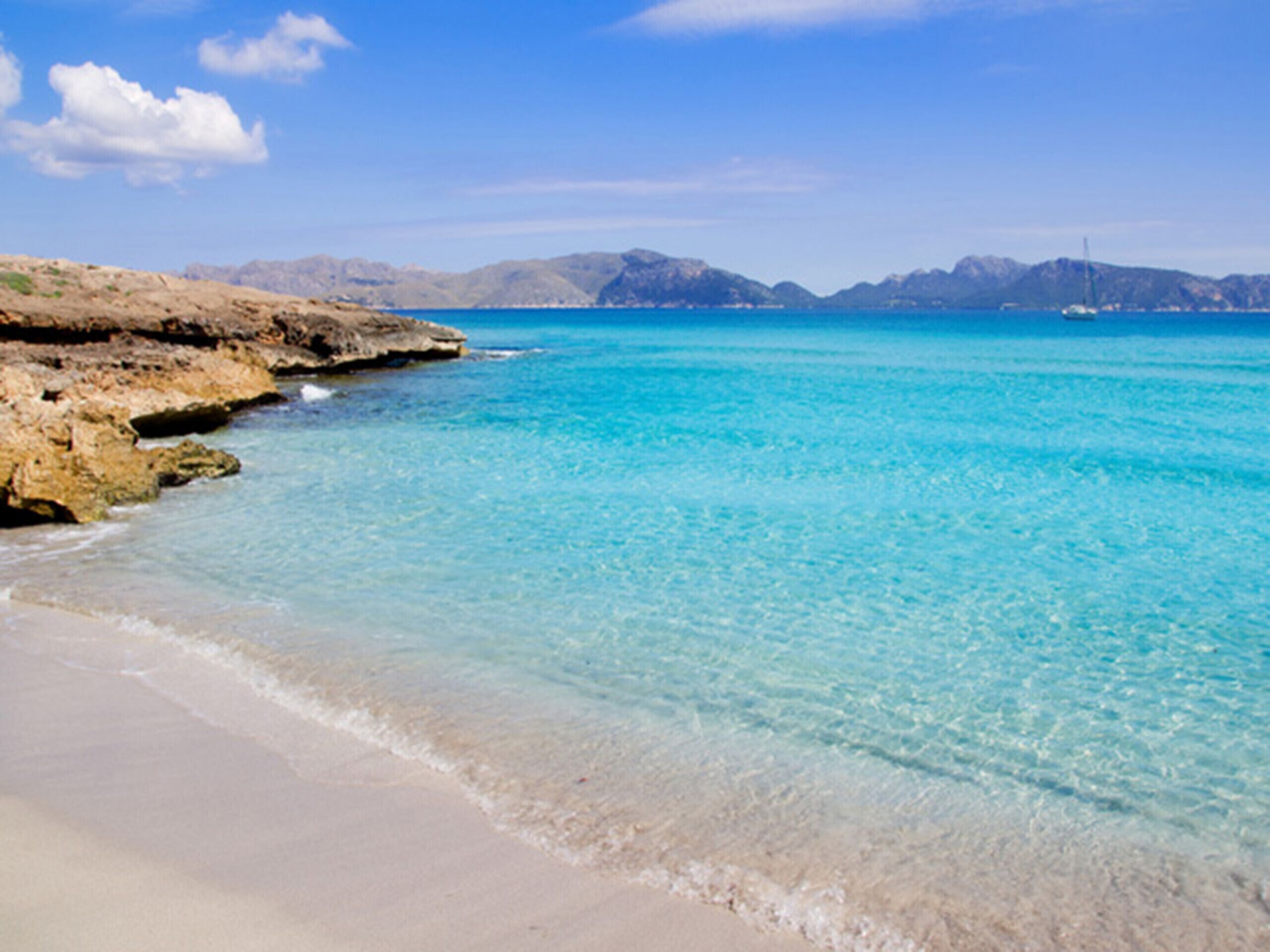 On the beach, sun loungers, beach towels