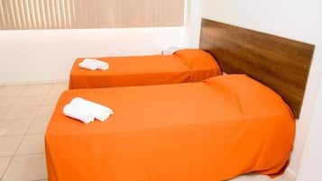 Apartamento Triplo | 15 quartos, frigobar, individualmente decorados
