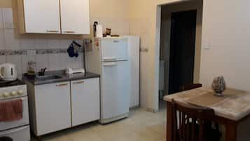 Classic Apartment, 1 Bedroom, Private Bathroom | Private kitchen | Full-sized fridge, oven, stovetop, cookware/dishes/utensils